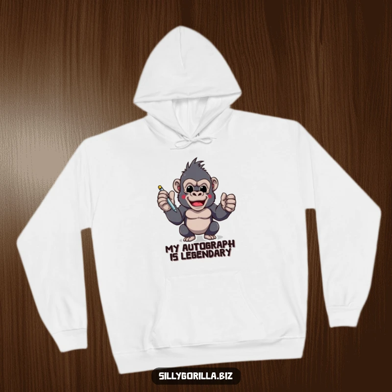 Funny hoodie depicting an excited gorilla character ready to sign with a pen, offering warmth and motivational humor.