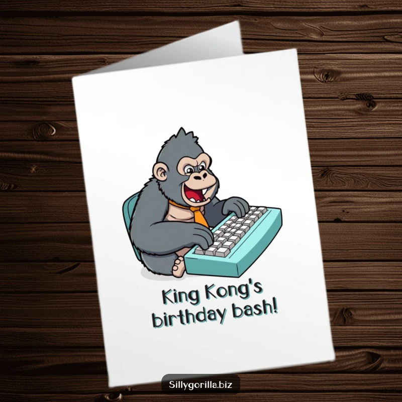 Funny Free Printable Birthday Card: Stylized gorilla in a tiny tie types fast on a huge keyboard.