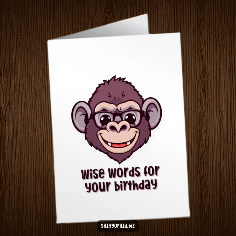 Funny Free Printable birthday card shows a stylized gorilla head with a wide, comical smile and tiny round spectacles, radiating cheerful intelligence.